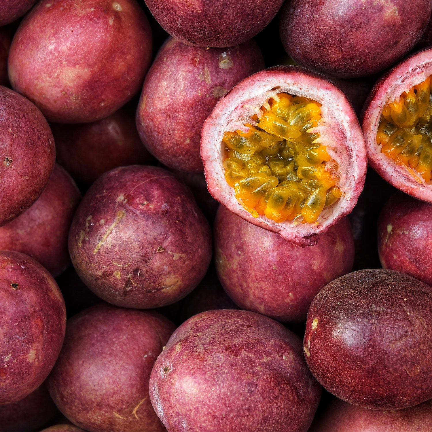 Passion Fruit fruits cut open in half